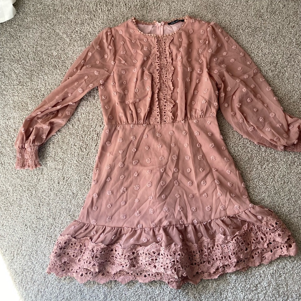 Cute mini dress with lace details.